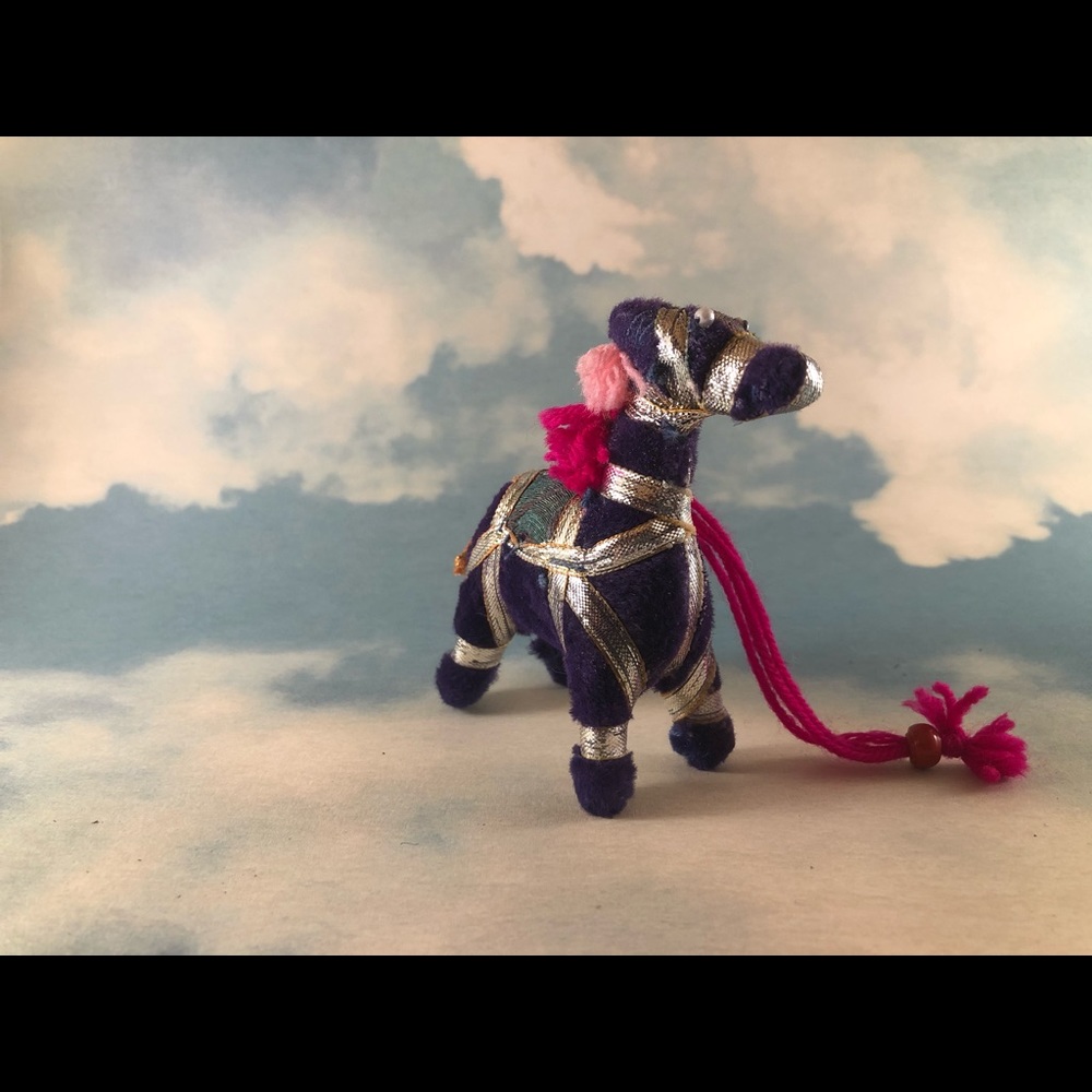 Five Festive Worldly Animal ornaments